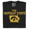 Black RAYGUN t-shirt featuring the text THE HOTGUY STATE in gold above a gold outline of Iowa containing a hawk logo.