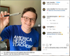 A young man wearing glasses and a blue AMERICA NEEDS TEACHERS t-shirt, supporting public education, holds up an I Voted pen.