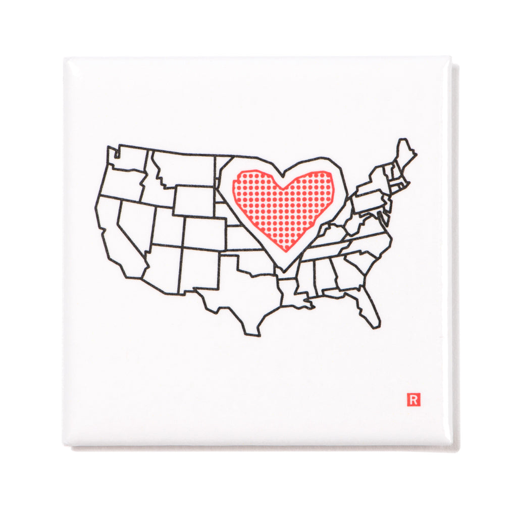 Outlined map of the United States with a red, dotted heart shape over the Midwest, designed as a metal magnet.