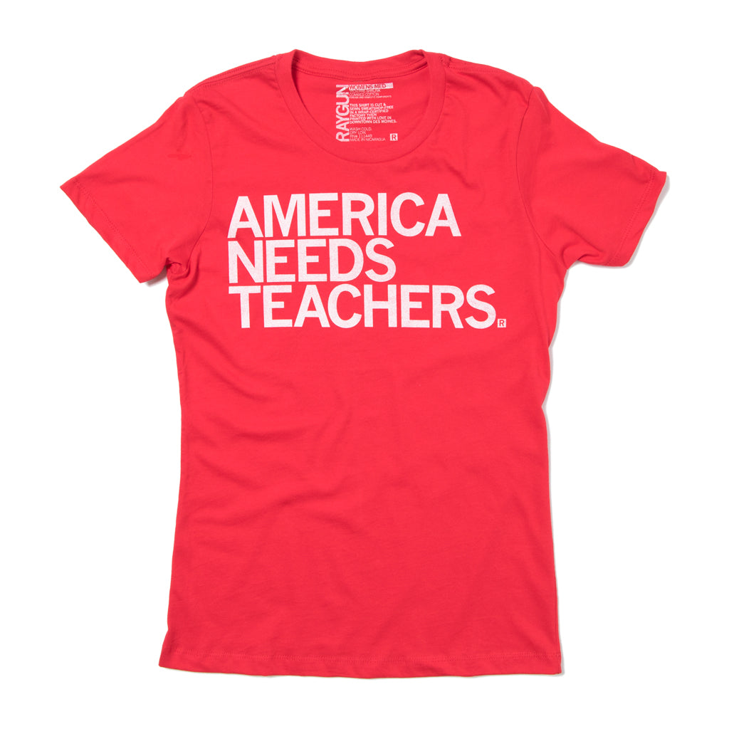 Red short-sleeved teachers shirt with the words AMERICA NEEDS TEACHERS printed in white on the chest.