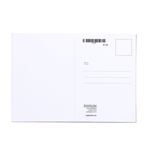 The back of a blank Ohio postcard with a stamp box, address lines, and the Raygun store logo printed in gold at the bottom.