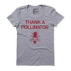 Grey crew neck pollinator t-shirt with the text THANK A POLLINATOR, an illustration of a bee, and the small text youre welcome! in red.