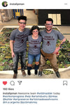 Three people wearing matching eco-friendly Thank a Pollinator t-shirts and safety glasses stand together on a large floor-covering printed with a forest garden motif.