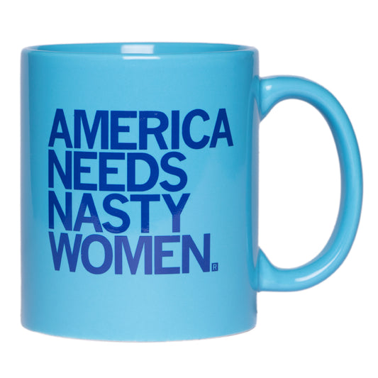 A pastel blue mug with royal blue text that says, "AMERICA NEEDS NASTY WOMEN"
