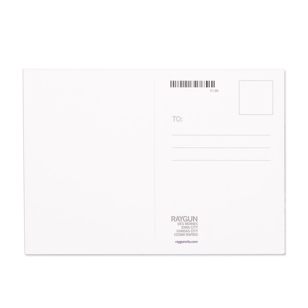 Back of a RAYGUN postcard with space for an address, a stamp box, and branding at the bottom.
