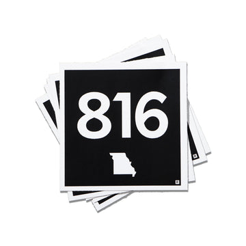 A stack of square vinyl stickers featuring the number 816 in white text over a black background, with a white silhouette of the Missouri area code below.