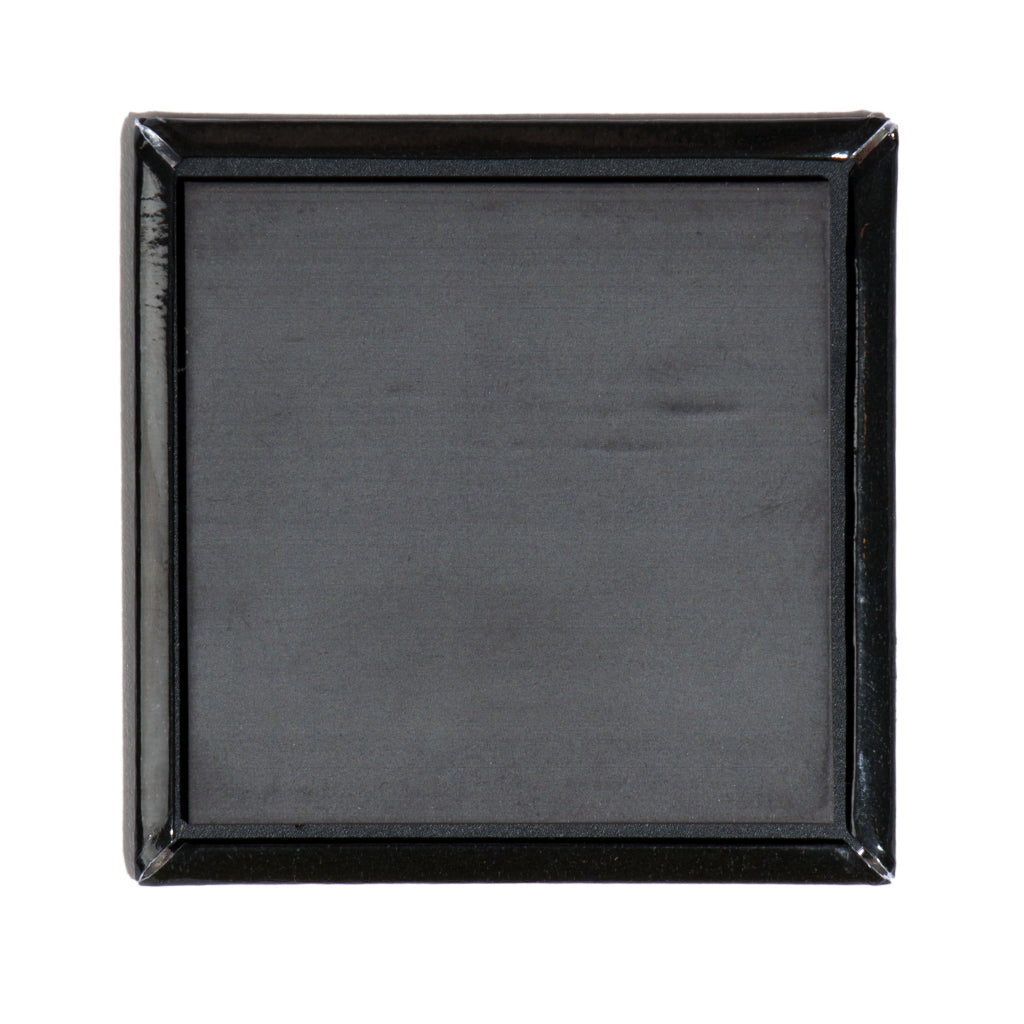 A square, black Midwesterners magnetic backing with a raised border.