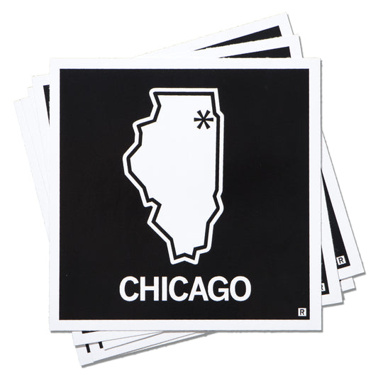 A stack of square RAYGUN vinyl stickers featuring a white outline of Illinois on a black background, with an asterisk marking Chicago’s location and the word CHICAGO printed below.