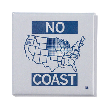 A square metal magnet pin featuring a map of the United States with the words NO above and COAST below; the Midwest region is highlighted with a dotted pattern.