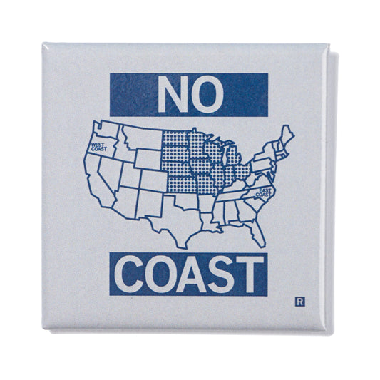 A square metal magnet pin featuring a map of the United States with the words NO above and COAST below; the Midwest region is highlighted with a dotted pattern.