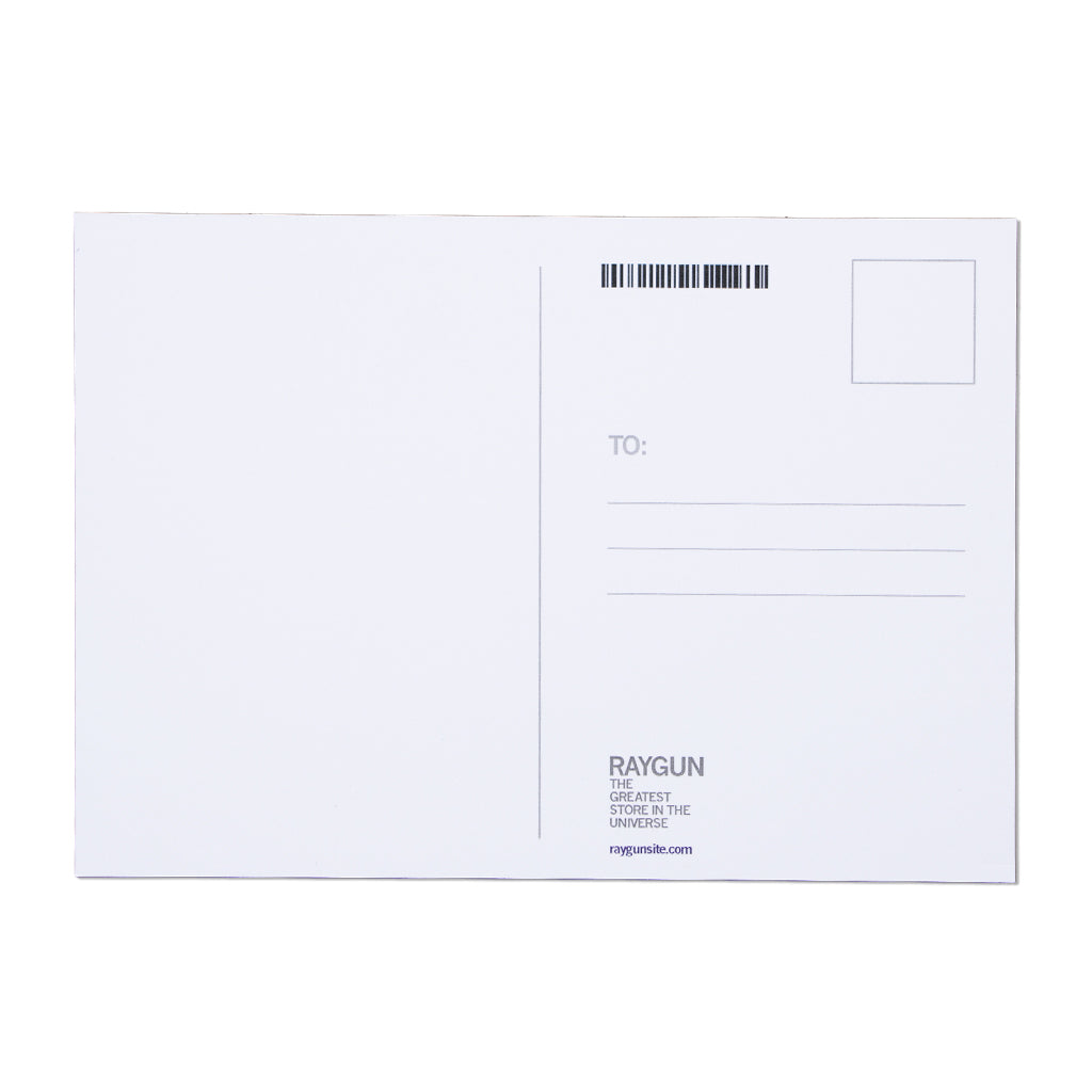 The back of a blank Midwestern Dictionary postcard with a stamp box, address lines, and the RAYGUN logo and website address printed in the bottom left corner.