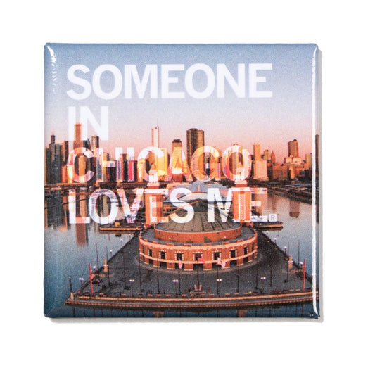 Square Chicago magnet featuring a skyline and Navy Pier photograph with the text SOMEONE IN CHICAGO LOVES ME overlaid in white.