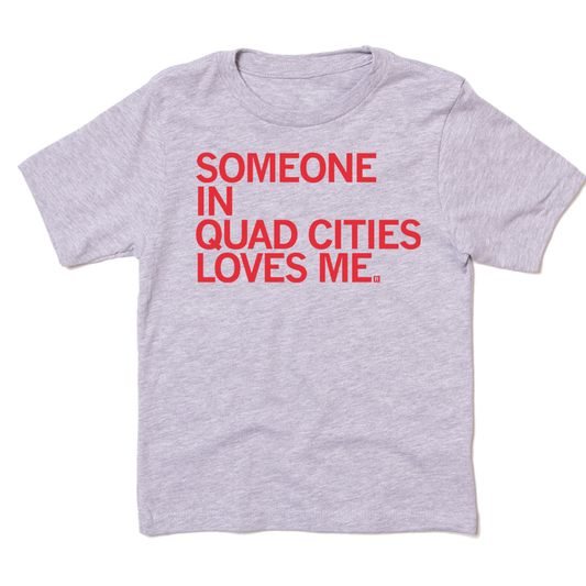 Light gray RAYGUN t-shirt featuring the red text SOMEONE IN QUAD CITIES LOVES ME.