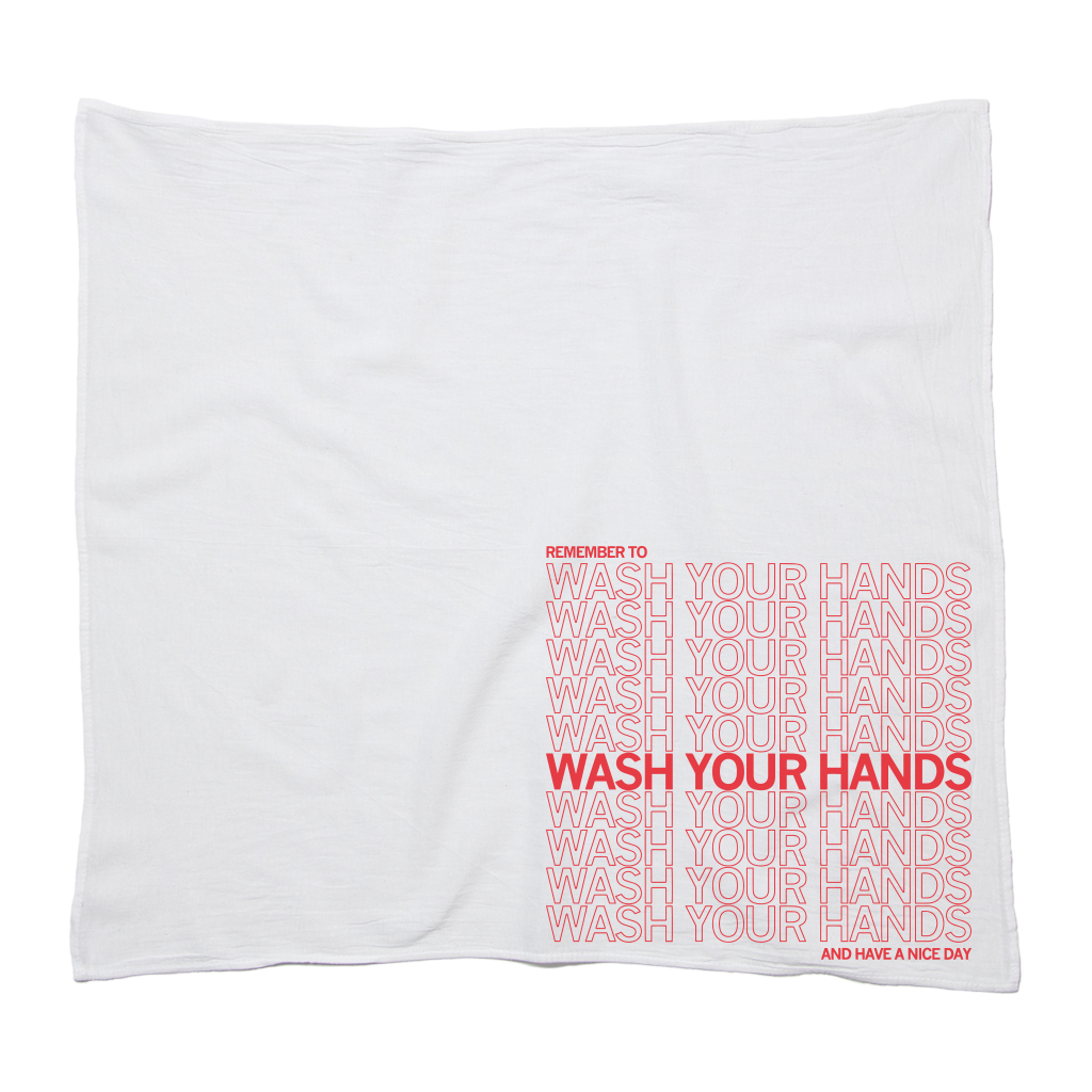 White flour sack kitchen towel printed with the repeated scarlet red text WASH YOUR HANDS, with REMEMBER TO at the top and AND HAVE A NICE DAY at the bottom.