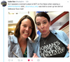 Two women posing for a selfie, one wearing a union-made t-shirt that reads WOMANS PLACE IS IN CHARGE, celebrating women’s empowerment.